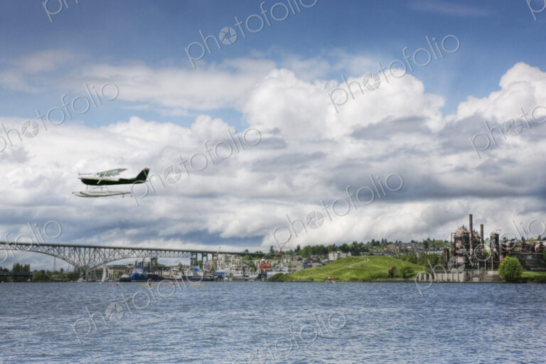 Lake Union, Washington State, a town on the coast, a factory and bridge, and a sea…