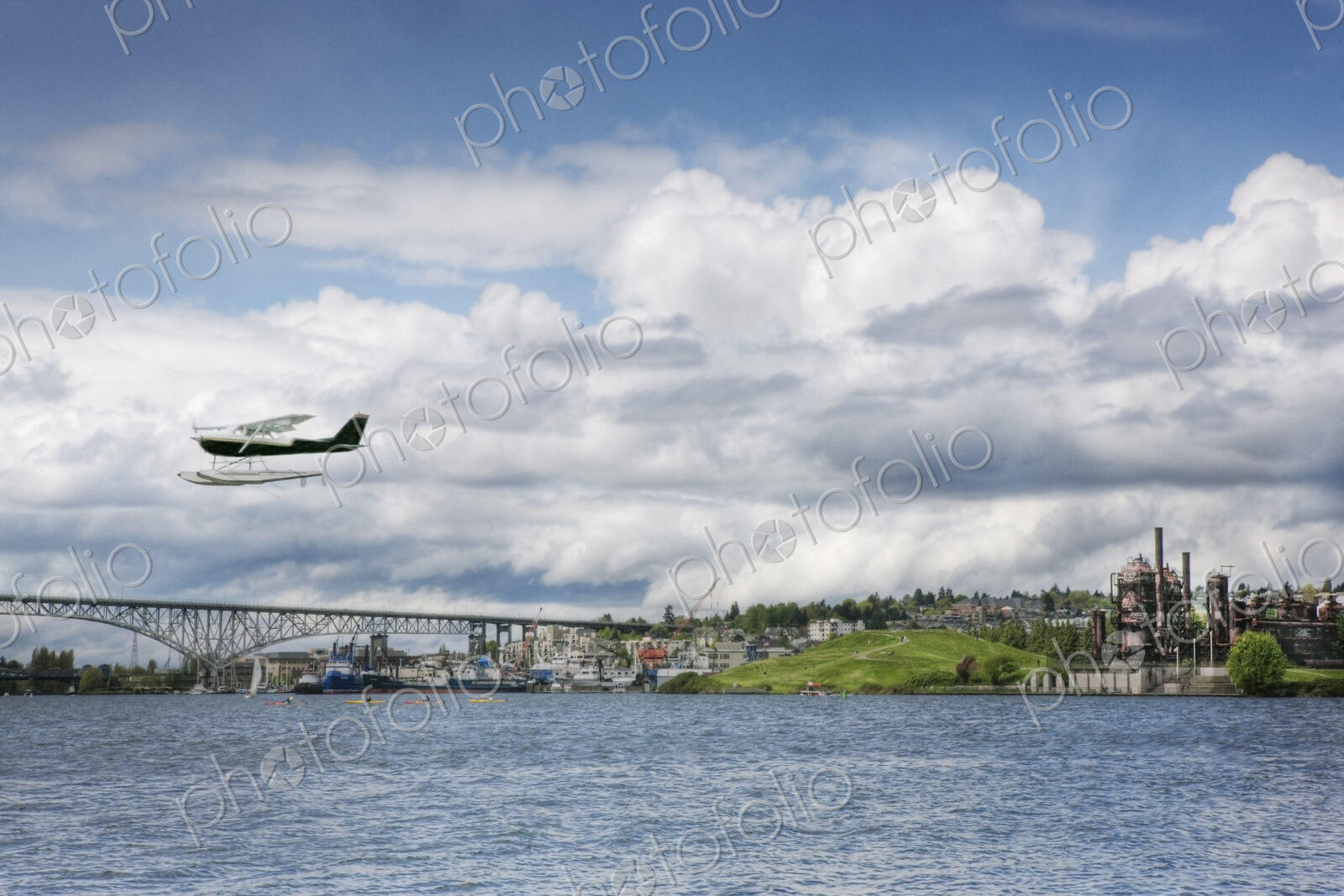 Lake Union, Washington State, a town on the coast, a factory and bridge, and a sea…