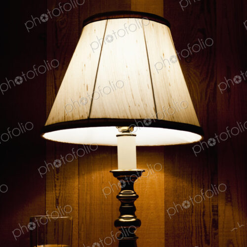 Lamp and Water on Nightstand Lamp and Water on Nightstand