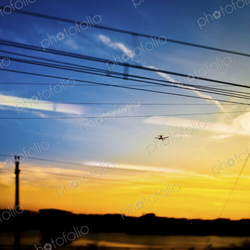 Landing Plane at Sunset Landing Plane at Sunset