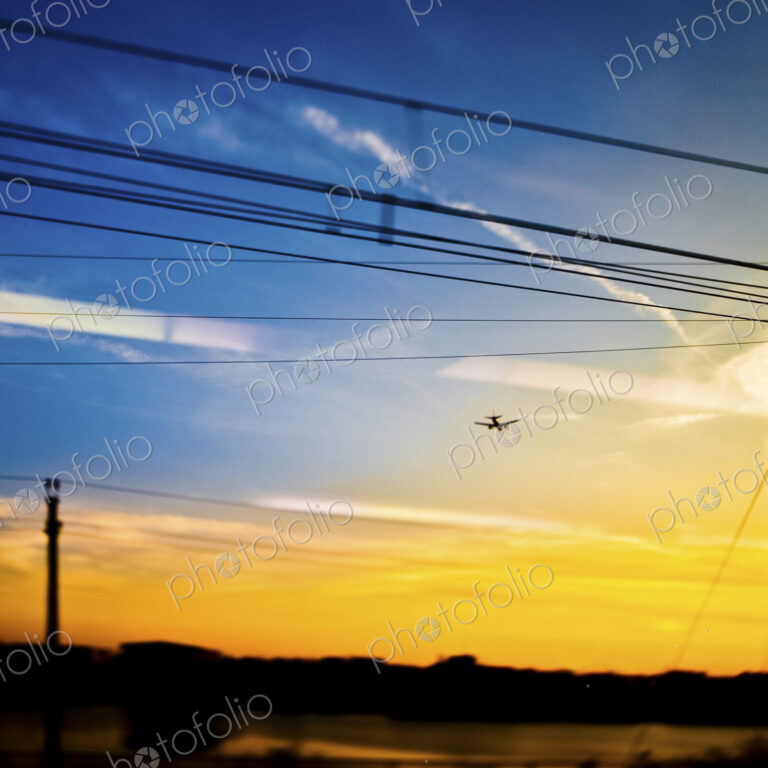 Landing Plane at Sunset