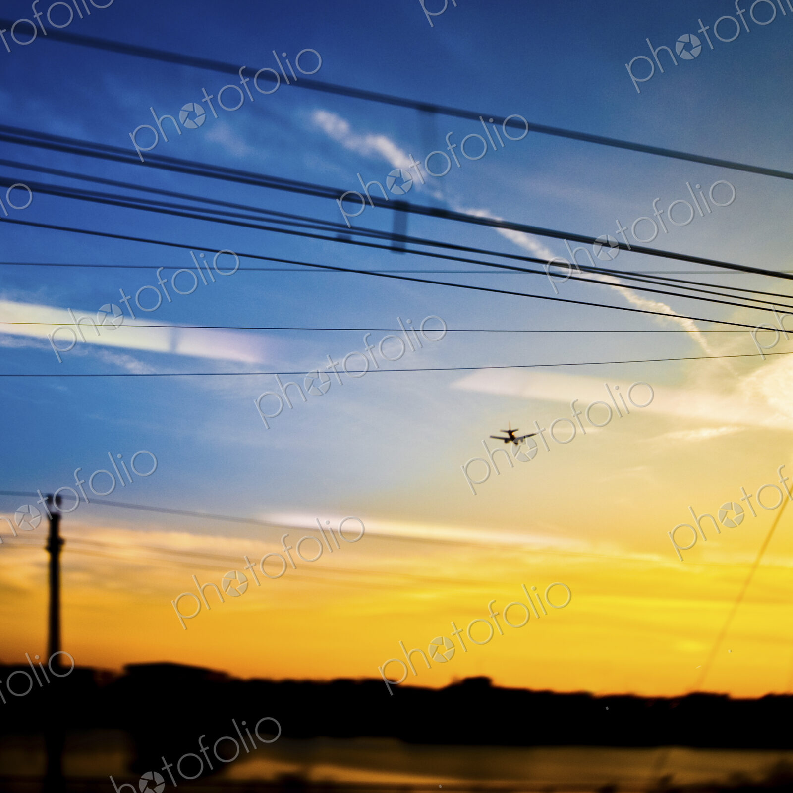 Landing Plane at Sunset
