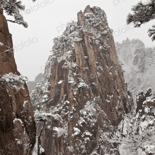 Landscape with snow-capped narrow steep mountain. Landscape with snow-capped narrow steep mountain.