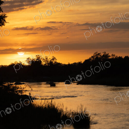 Landscape with sunset over a river. Landscape with sunset over a river.