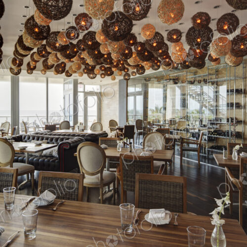 Lanterns over tables in modern restaurant