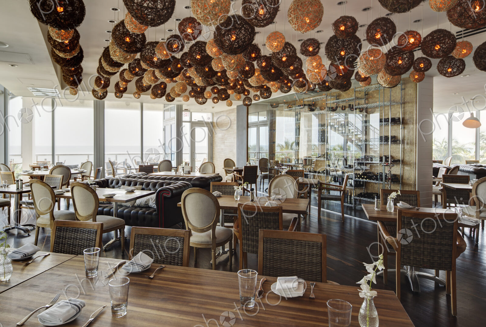Lanterns over tables in modern restaurant