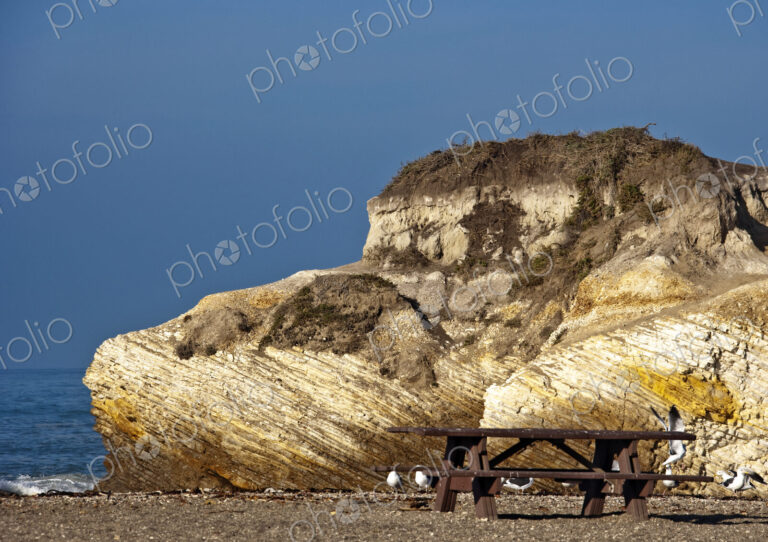 Large Rock and Picnic Area on Beach