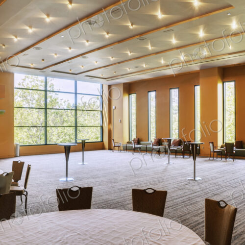 Large empty room in a hotel or conference centre, tables and chairs. Large empty room in a hotel or conference centre, tables and chairs.