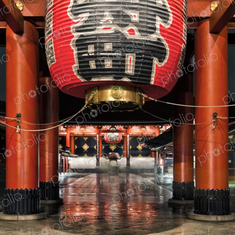 Large paper lantern hangs over the entrance to Senso-Ji Temple at night, Asakusa,…