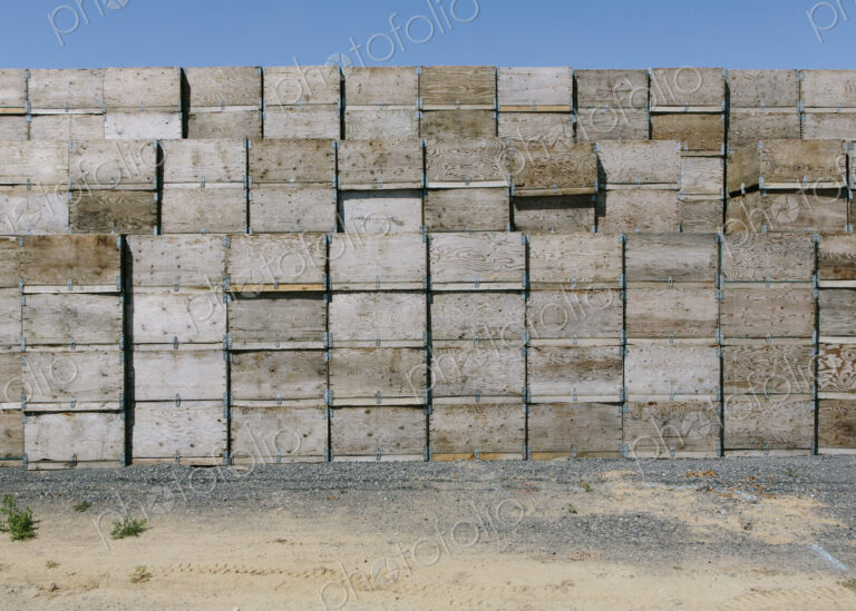 Large stack of fruit boxes for harvesting and storing apples, near Quincy