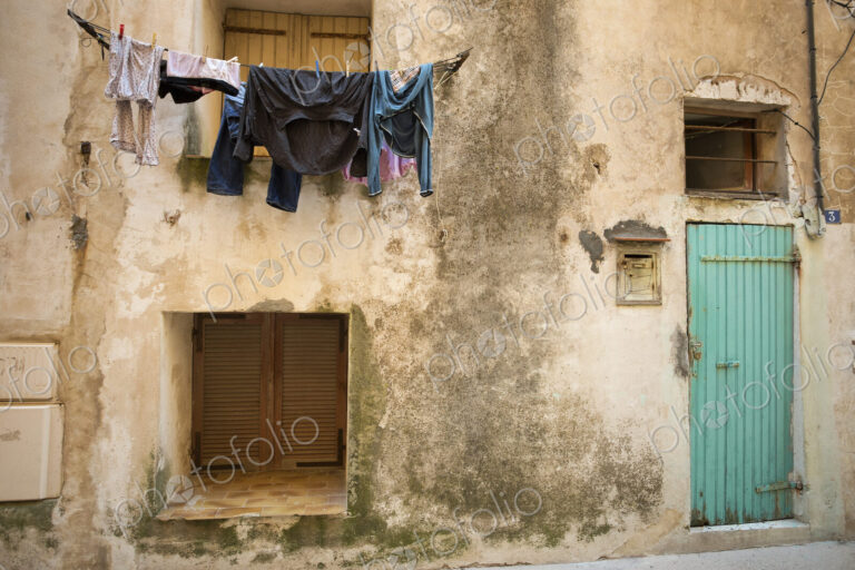 Laundry drying on a washing line outside a house in Bonifacio on Corsica.