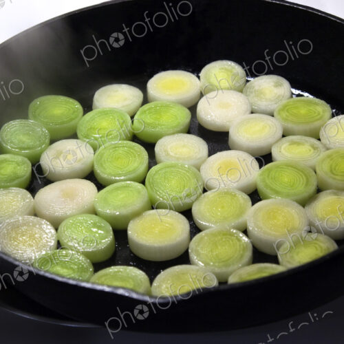 Leeks Cooking in Cast Iron Skillet Leeks Cooking in Cast Iron Skillet