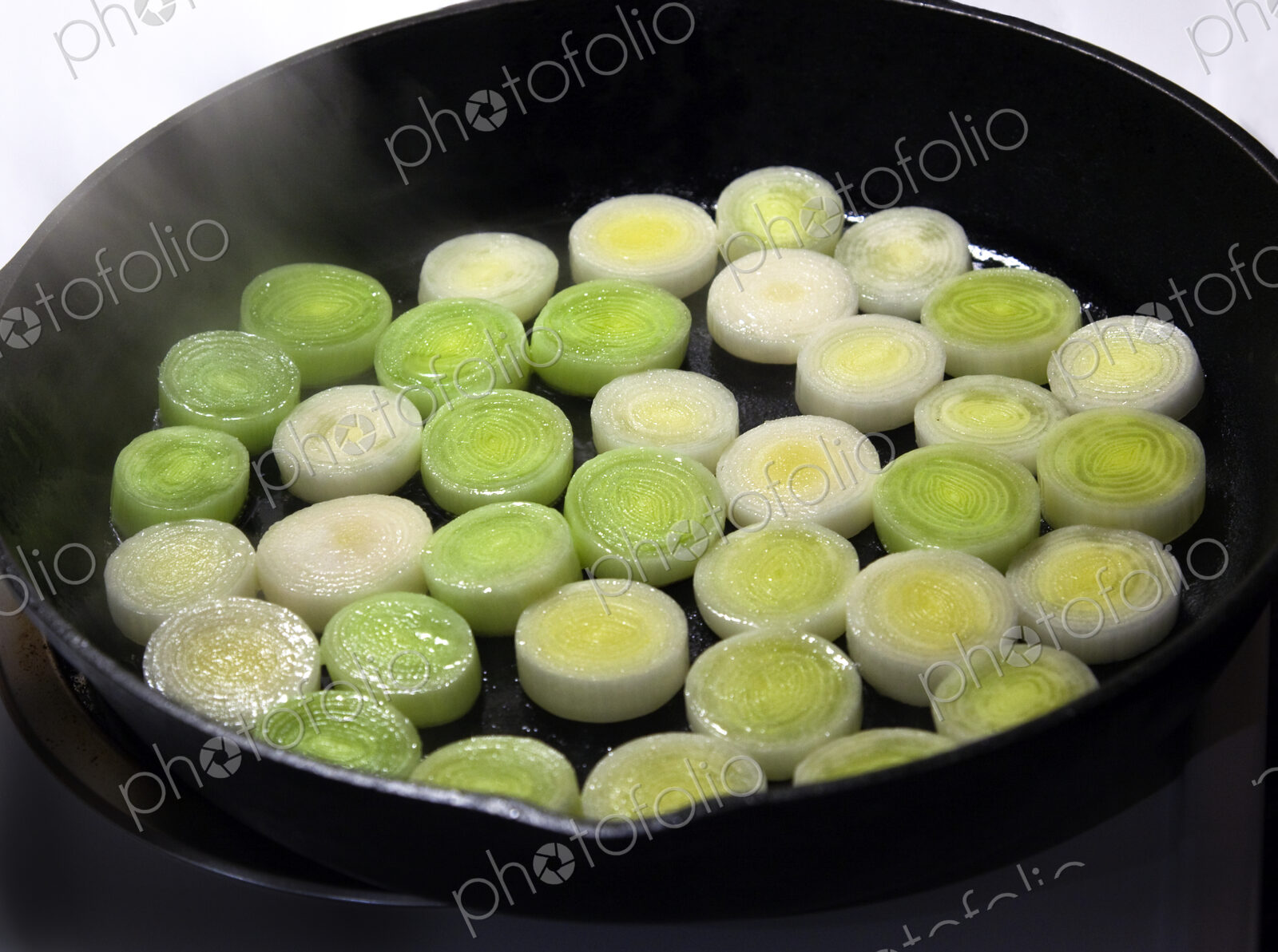 Leeks Cooking in Cast Iron Skillet