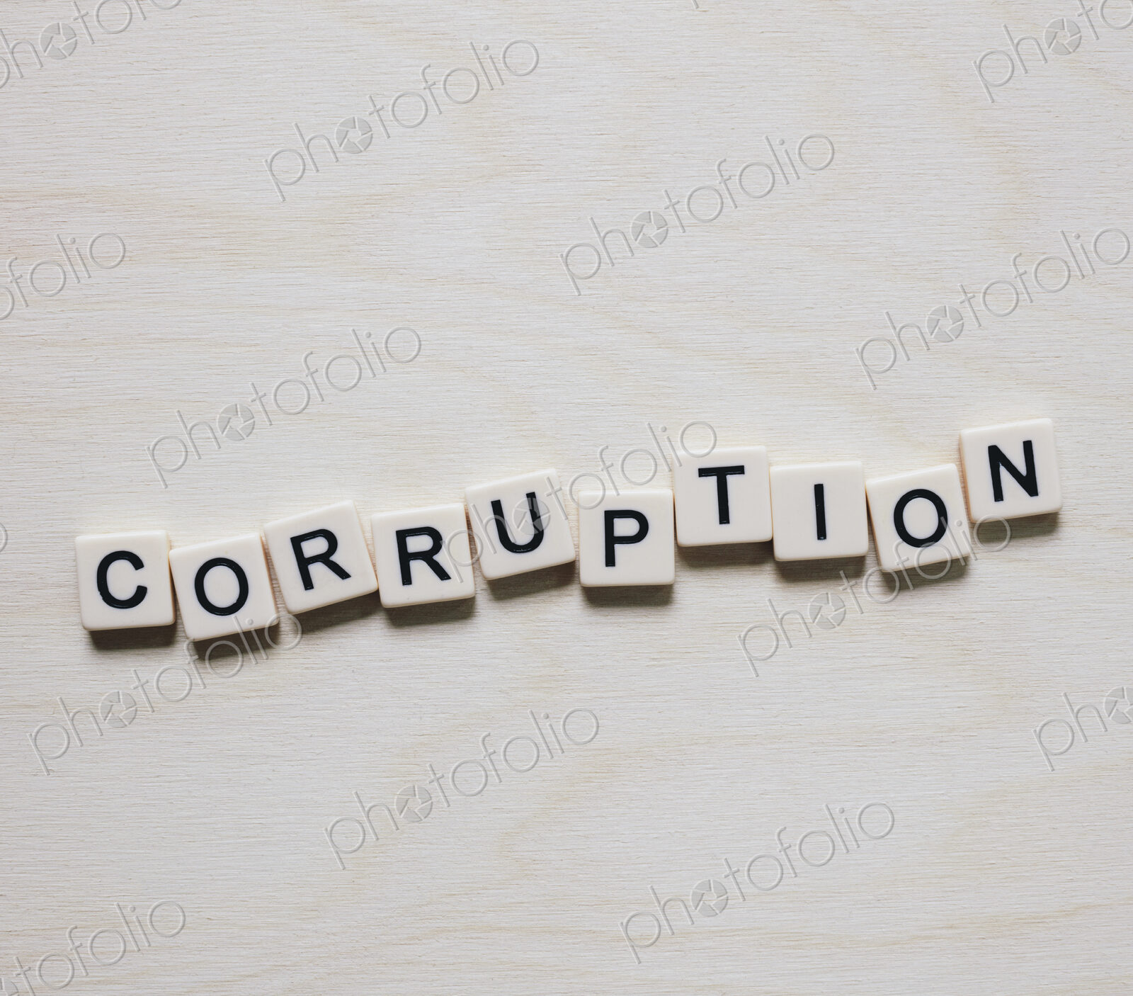 Letter blocks spelling the word CORRUPTION