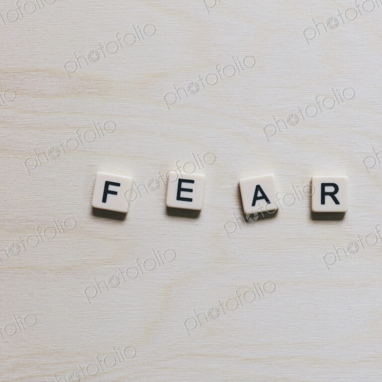 Letter blocks spelling the word "FEAR"