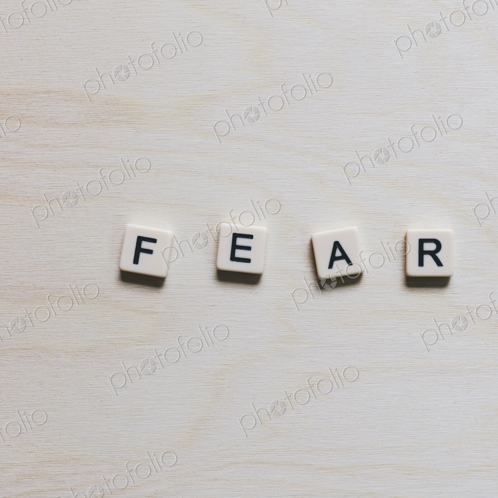Letter blocks spelling the word “FEAR”