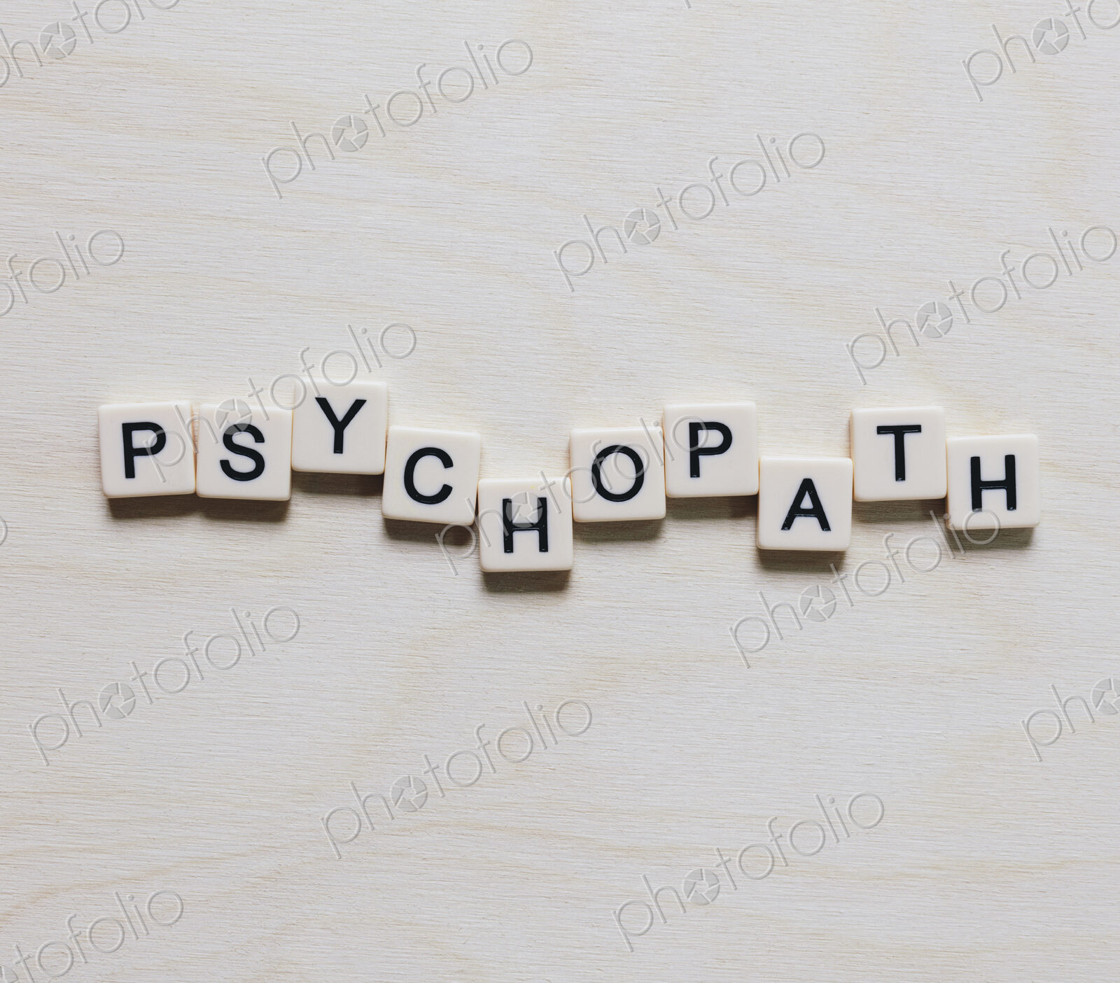 Letter blocks spelling the word “PSYCHOPATH”