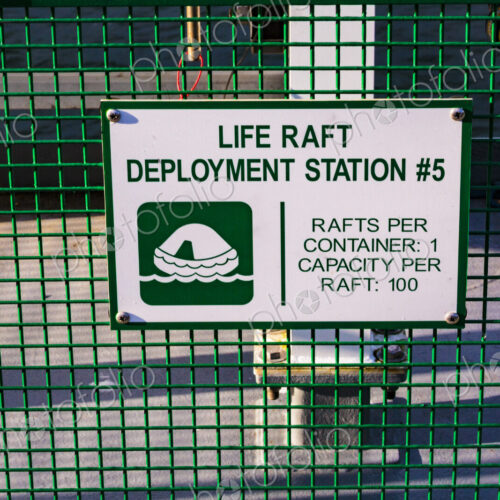 Life raft deployment station sign on a ferry in Seattle, an information sign. Life raft deployment station sign on a ferry in Seattle, an information sign.