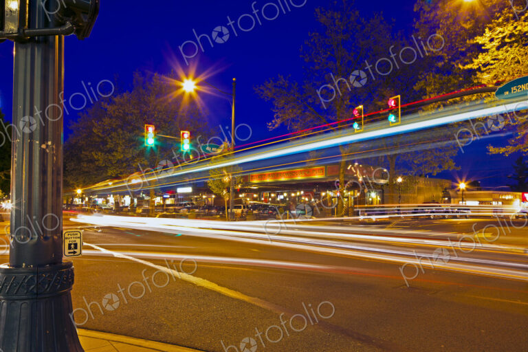 Light Trails Through an Intersection at Night