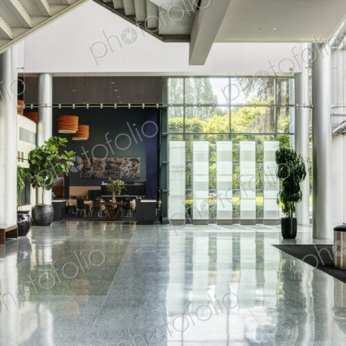 Light and airy atrium of a modern building with marble floors. Light and airy atrium of a modern building with marble floors.