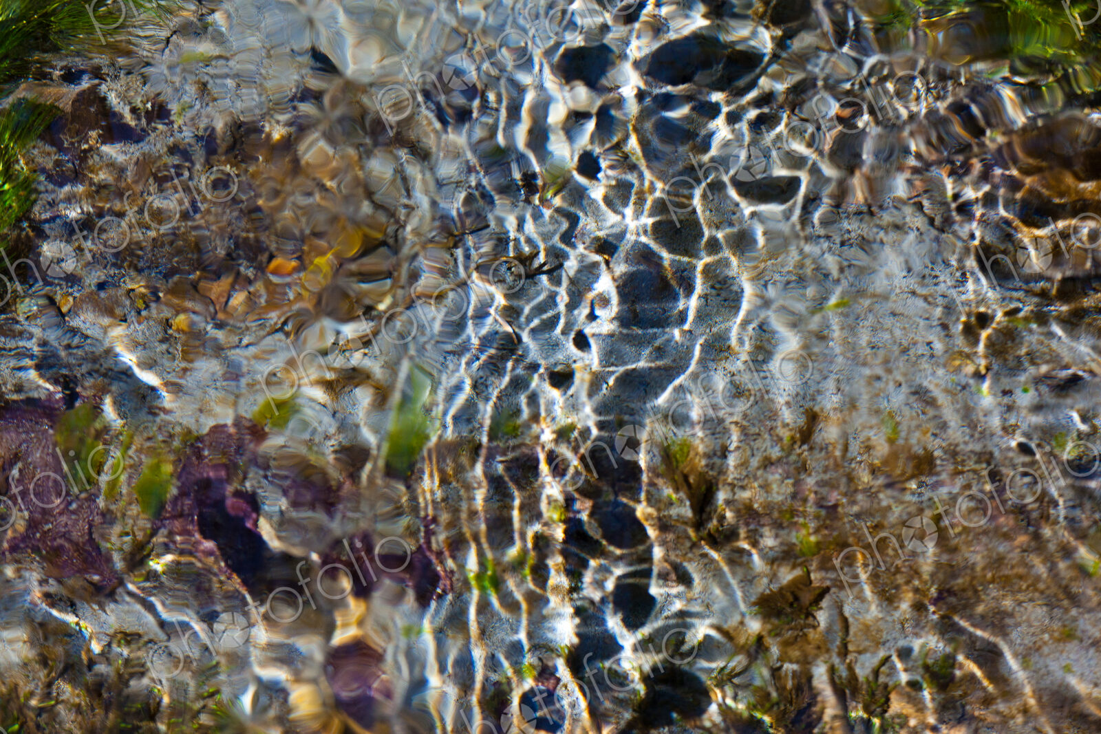 Light and shadow on ripples in a shallow section of the Sol Duc River, Olympic…