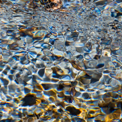 Light and shadow on ripples in a shallow section of the Sol Duc River, Olympic… Light and shadow on ripples in a shallow section of the Sol Duc River, Olympic…
