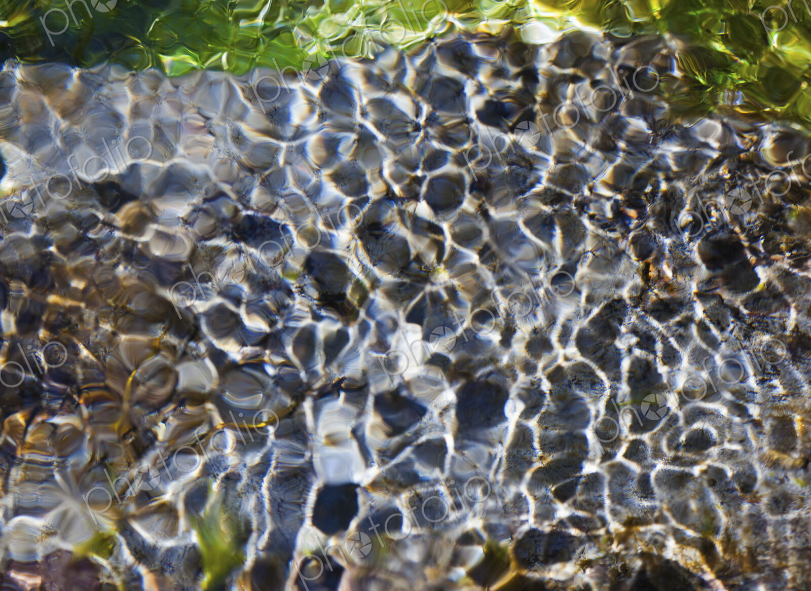 Light and shadow on ripples in a shallow section of the Sol Duc River, Olympic…