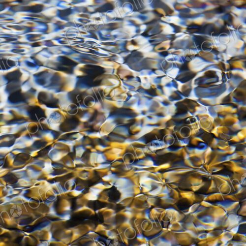 Light and shadow on ripples in a shallow section of the Sol Duc River, Olympic… Light and shadow on ripples in a shallow section of the Sol Duc River, Olympic…