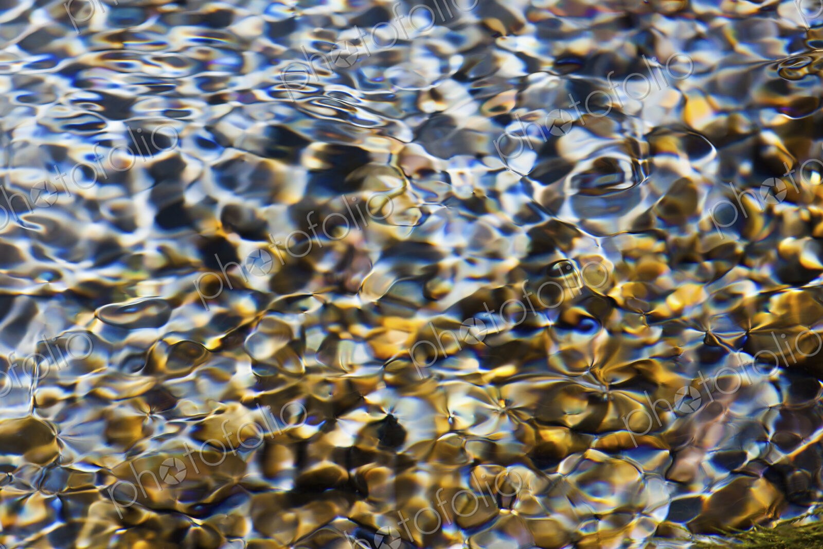 Light and shadow on ripples in a shallow section of the Sol Duc River, Olympic…