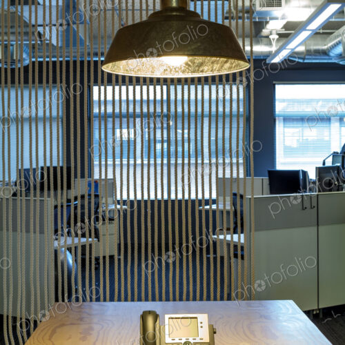 Light fixture over phone in office conference room Light fixture over phone in office conference room