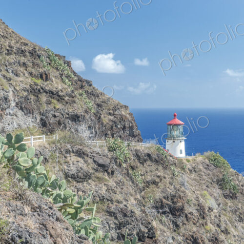 Lighthouse on hillside at Makapuu Point.