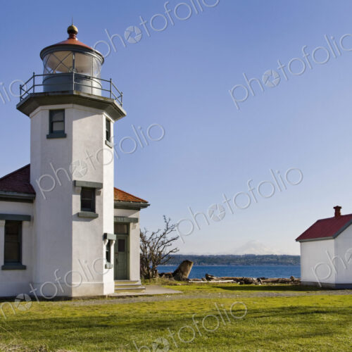Lighthouse overlooking ocean, Point Robertson, Washington, United States