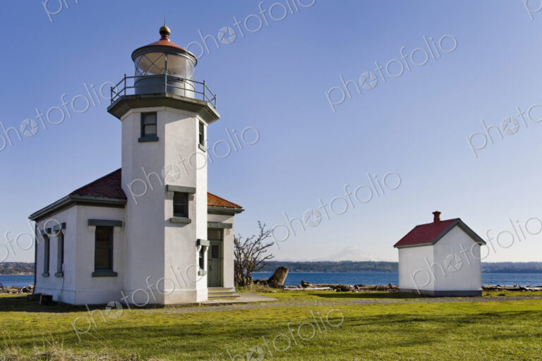 Lighthouse overlooking ocean, Point Robertson, Washington, United States