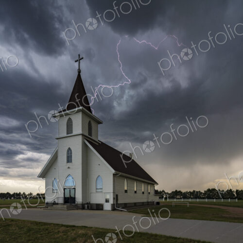 Lightning Strike near the Berea Evangelical Lutheran Church, a small church under a… Lightning Strike near the Berea Evangelical Lutheran Church, a small church under a…