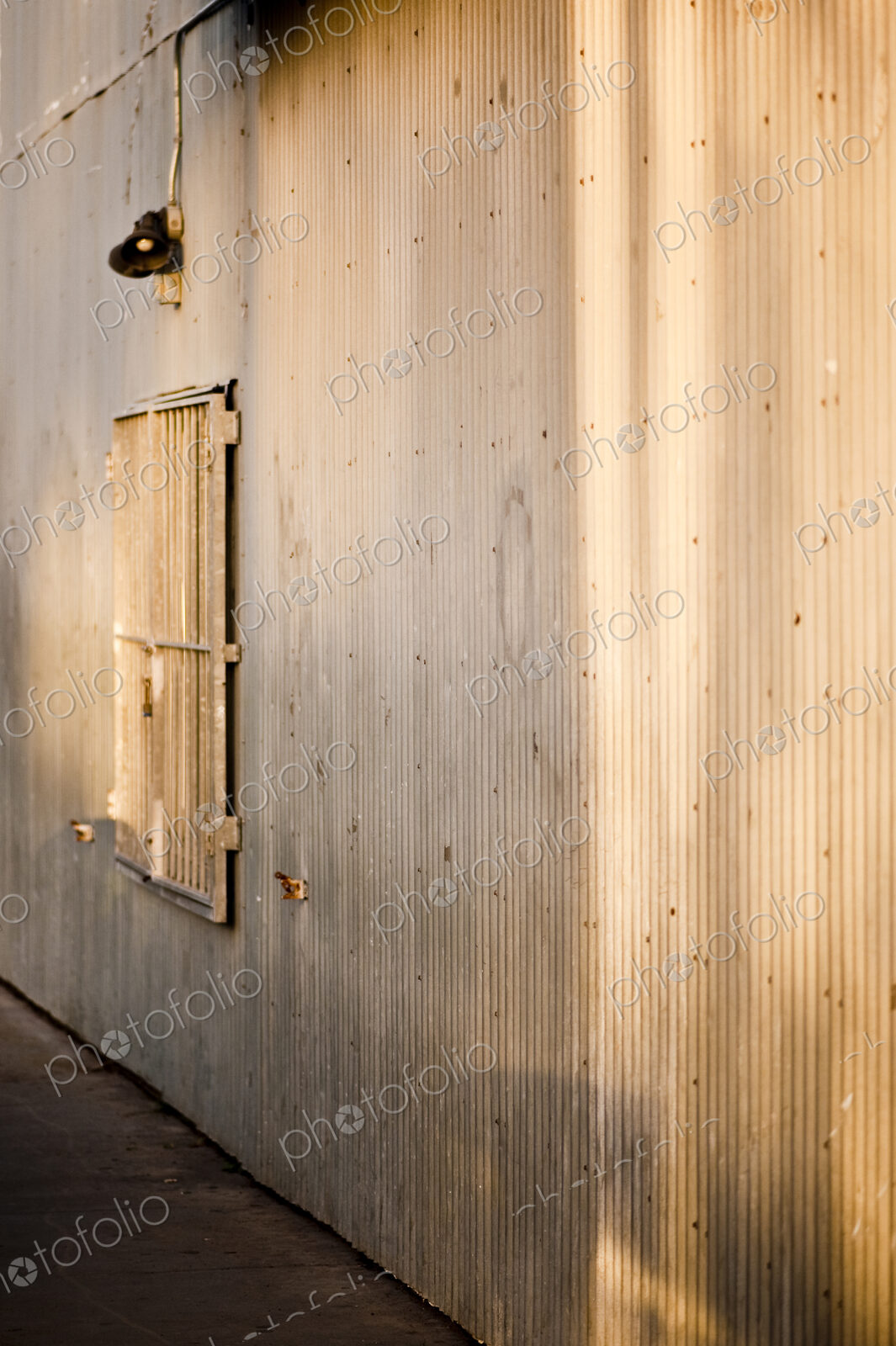 Lights Above a Bared Building Window