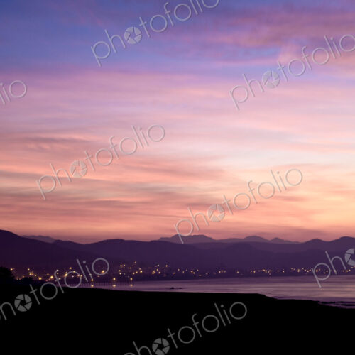 Lights Emanating From City in Distance Lights Emanating From City in Distance