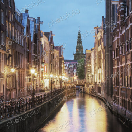 Lit Canal Between Buildings