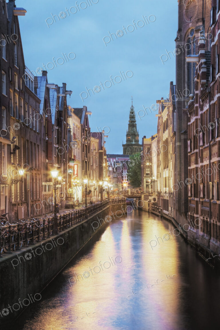 Lit Canal Between Buildings