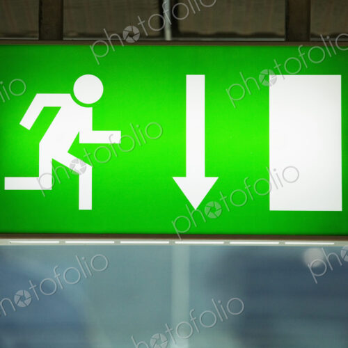Lit emergency exit sign.