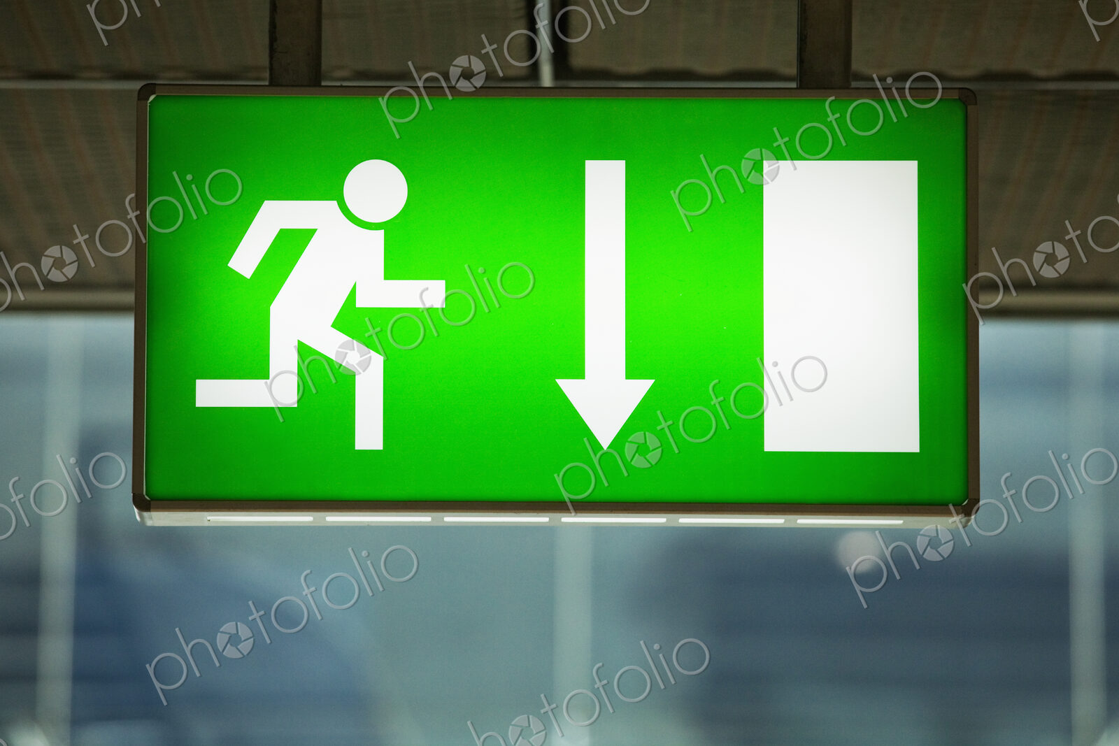 Lit emergency exit sign.
