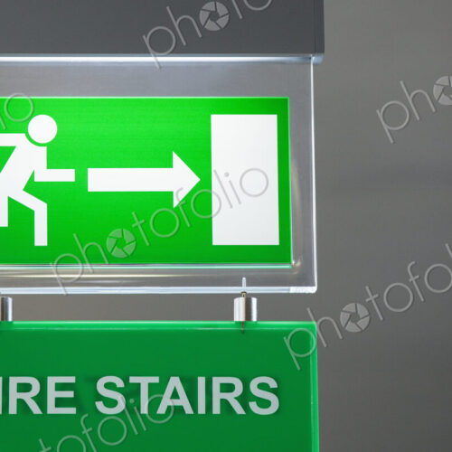Lit emergency exit sign.