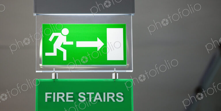 Lit emergency exit sign.