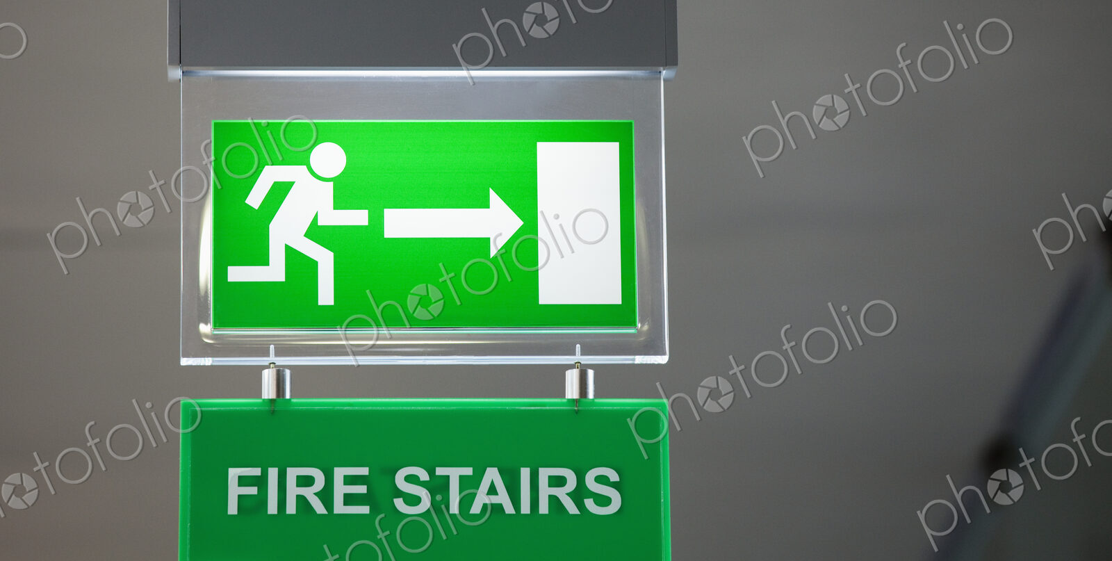 Lit emergency exit sign.