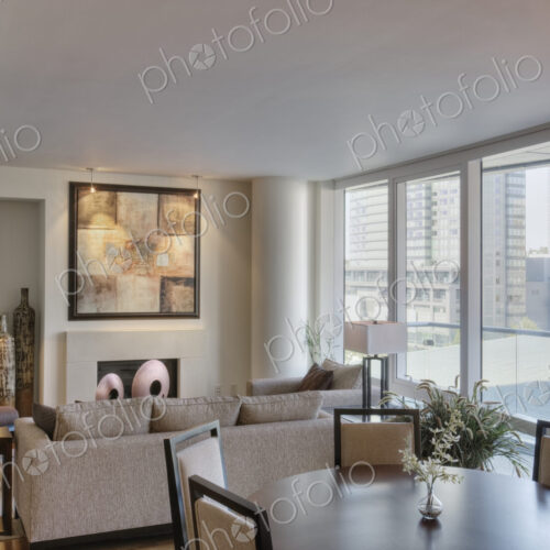 Living room and dining room in luxury highrise apartment