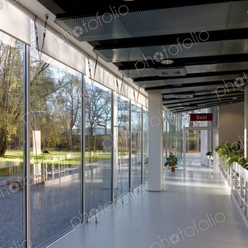 Lobby of hotel or conference centre with glass walls. Lobby of hotel or conference centre with glass walls.
