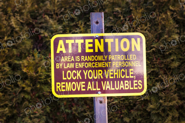 Lock Your Vehicles sign in a public park, Spokane, WA USA