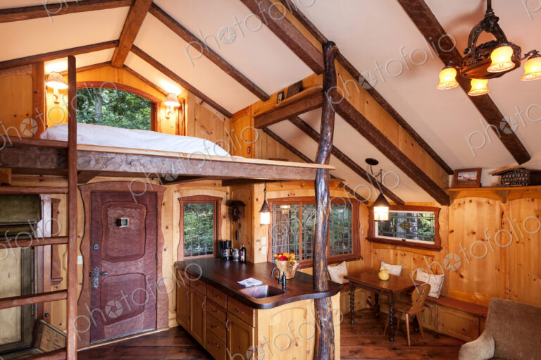 Loft bedroom in wooden tree house