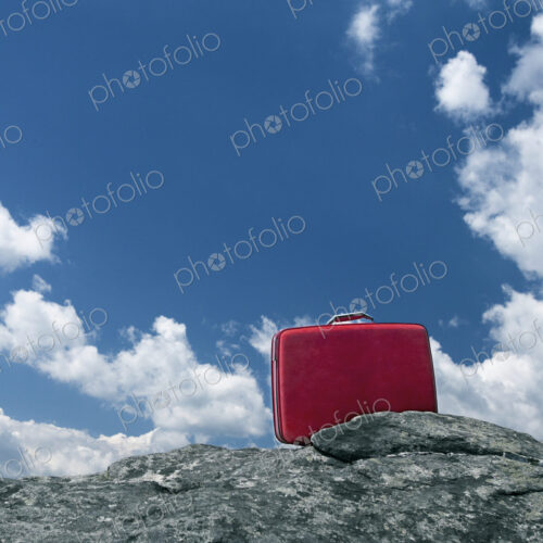 Lone Red Suitcase Outdoors