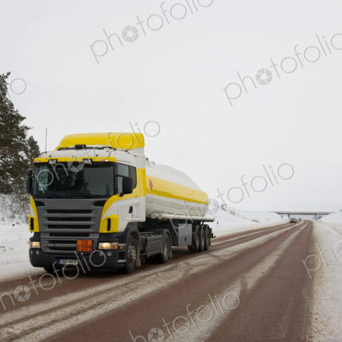 Lorry driving on snowy rural road. Lorry driving on snowy rural road.