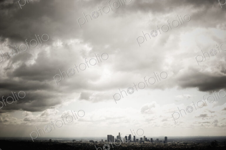 Los Angeles Skyline Beneath Cloudy Sky